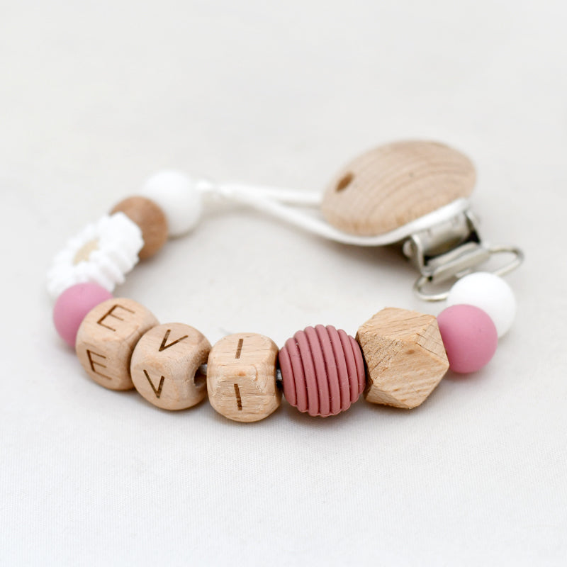 Speenkoord naam hout - roze madelief