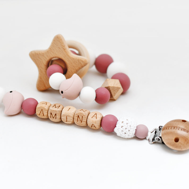 Speenkoord naam hout - roze vogel