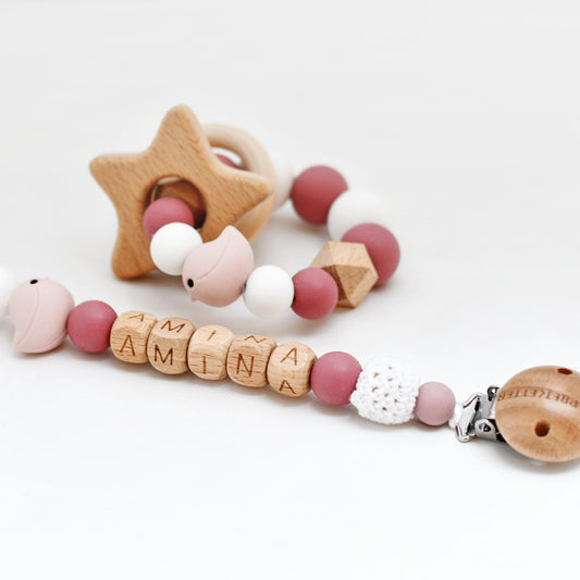 Speenkoord naam hout - roze vogel