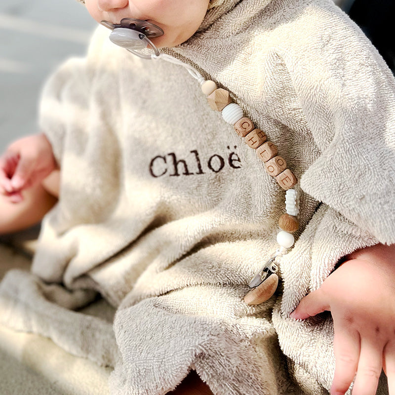 Pretletter poncho met naam badstof kind beige
