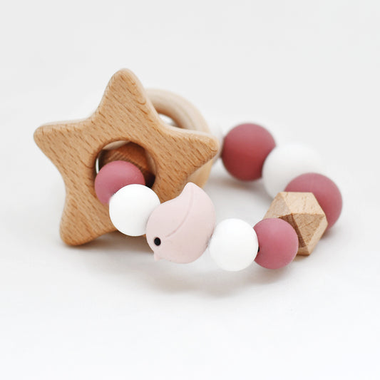 Bijtring - Roze vogel