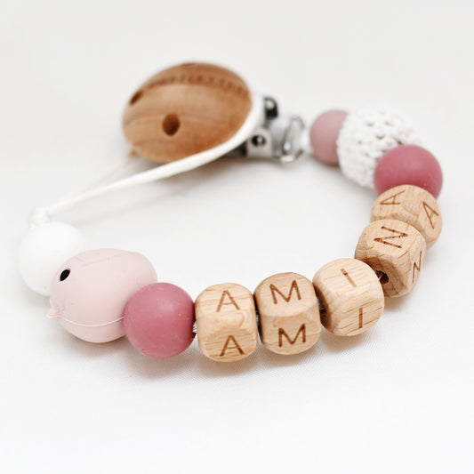 Speenkoord naam hout - roze vogel