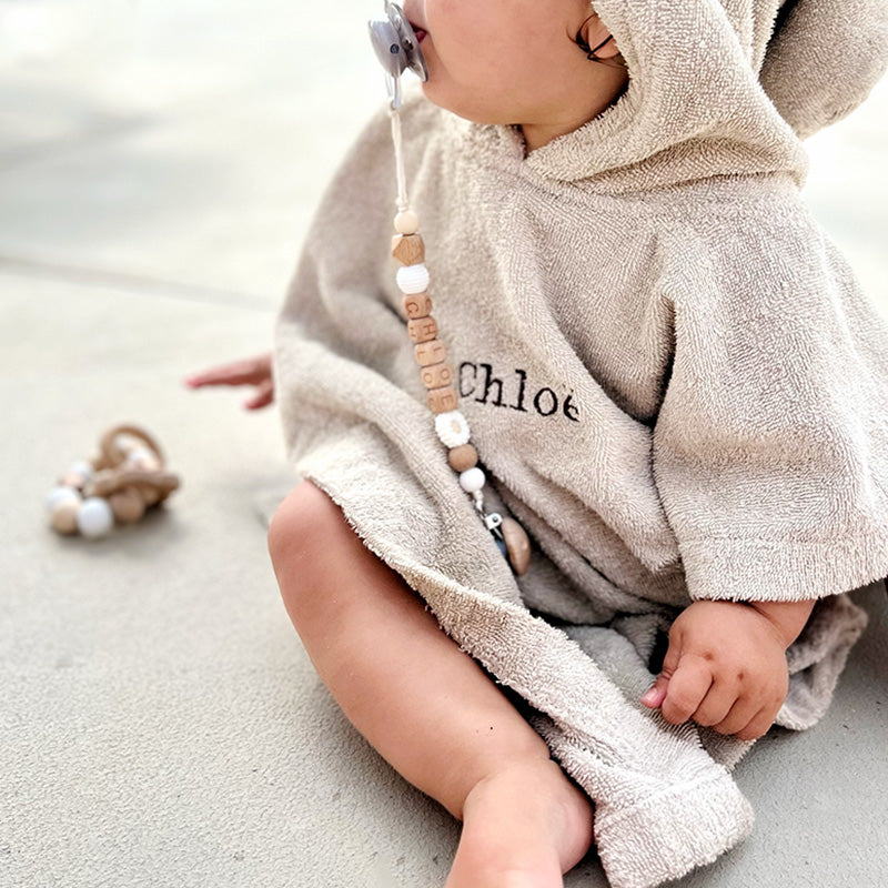 Pretletter poncho met naam badstof kind beige