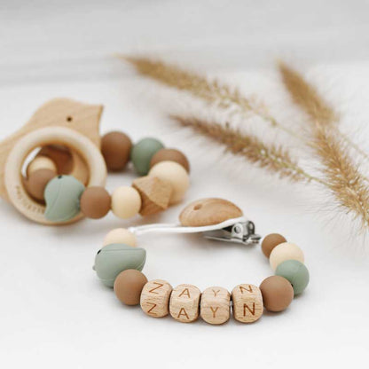 Speenkoord naam hout - bruin vogel