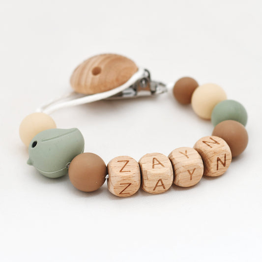 Speenkoord naam hout - bruin vogel