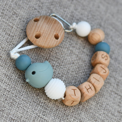 Speenkoord naam hout - Blauw vogel
